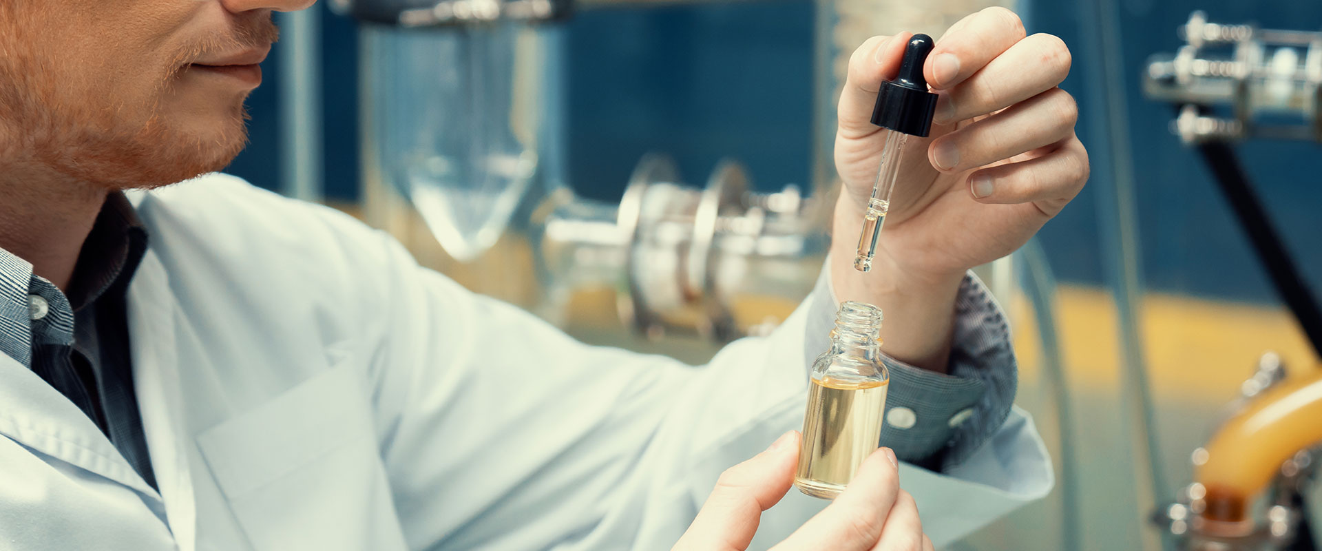 lab technician working with lab equipment