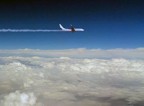 Chef and workers in restaurant kitchen