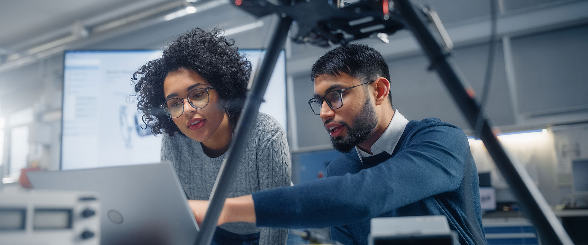 Students reviewing computer screen